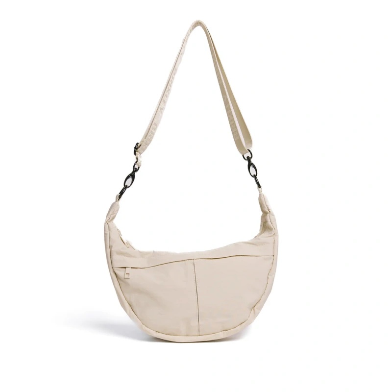 Functional crescent bag with multiple compartments